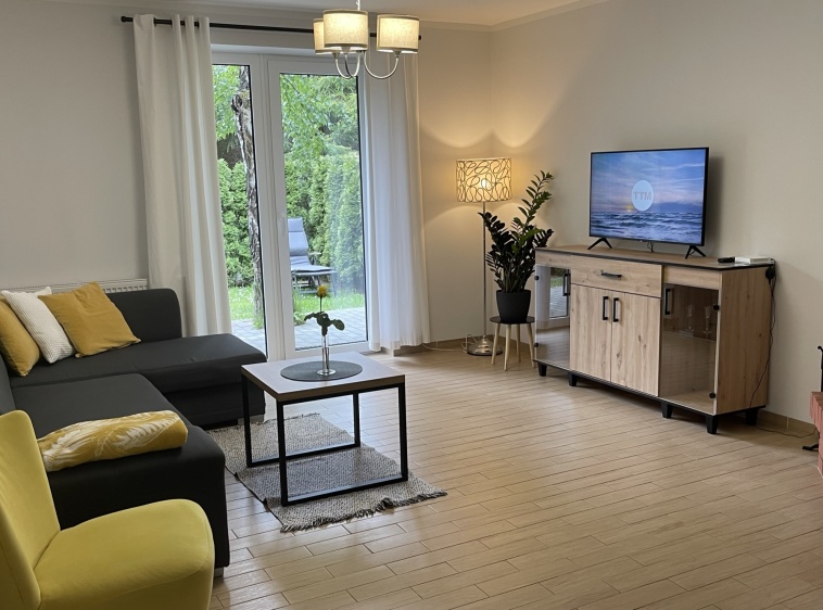 Dom pod Brzozą Salon w apartamencie na parterze